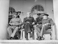 Joseph Stalin, Franklin D Roosevelt and Winston Churchill on the veranda of the Soviet Legation in Teheran, during the first 'Big Three' Conference, November 1943. A20710.jpg
